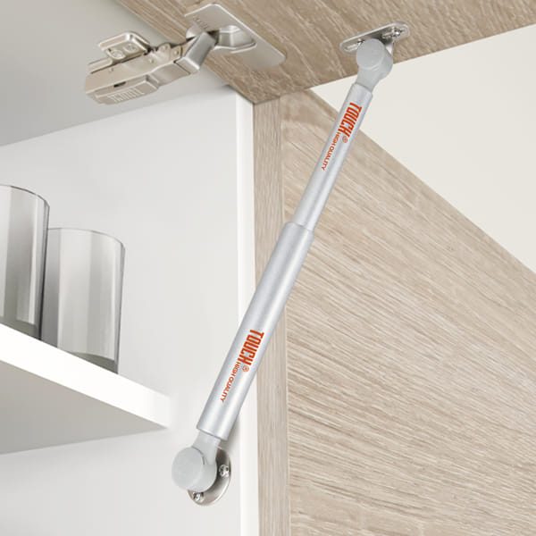 Full opening cabinet doors gas spring strut TCH-31207 FL.245 with smooth controlled motion, secure open position, and durable design for modern cabinetry